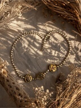 Cream Pearl Necklace with Gold Floral Medallion Accents